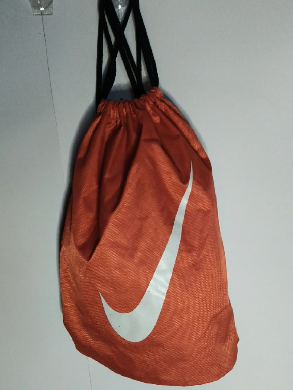 Nike Orange And Black Reversible Drawstring Backpack with White Swoosh